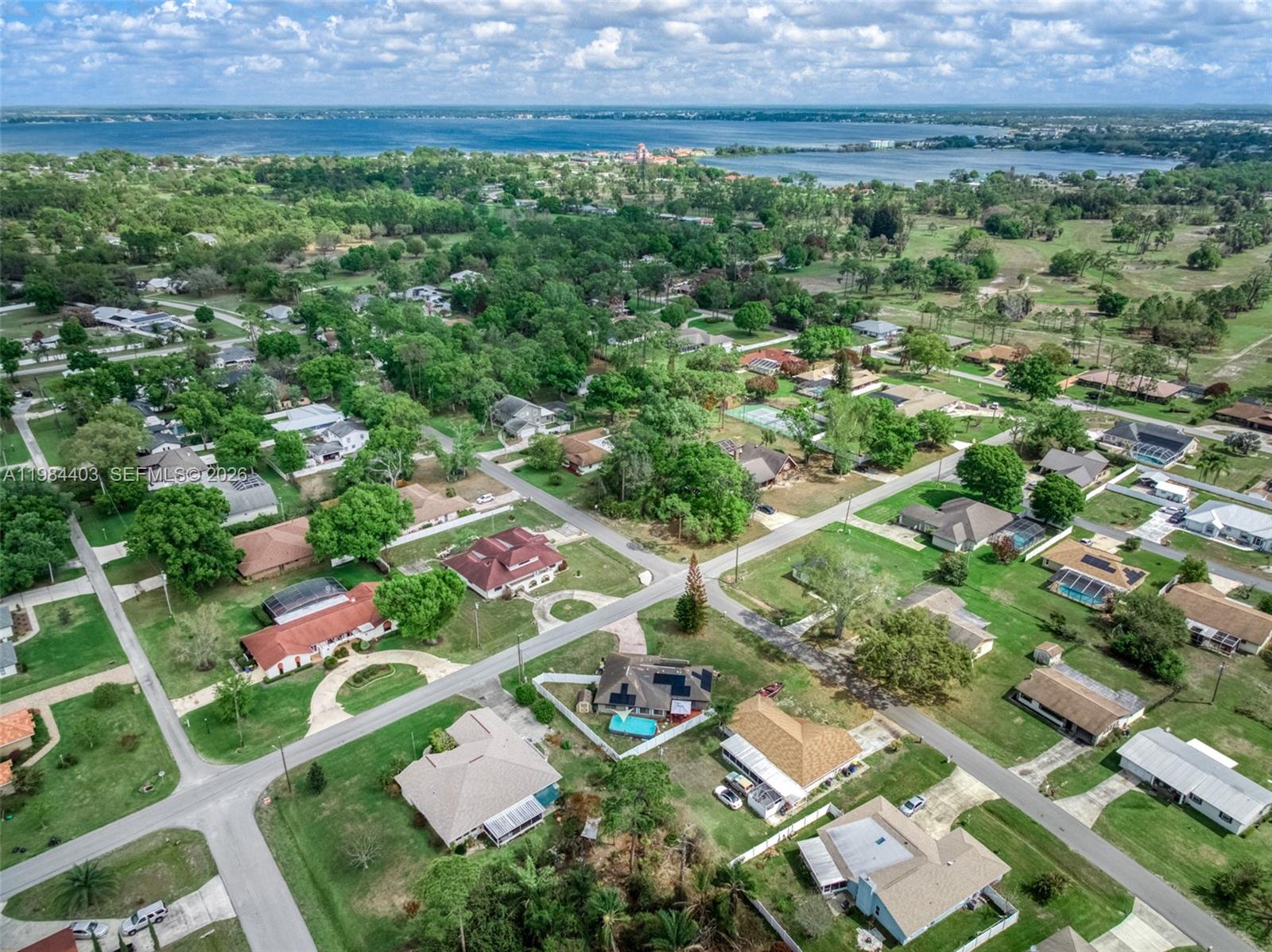 4201 Westminster Road Sebring, FL 33875 - Photo 43 of 43 an aerial view of residential houses with outdoor space and street view