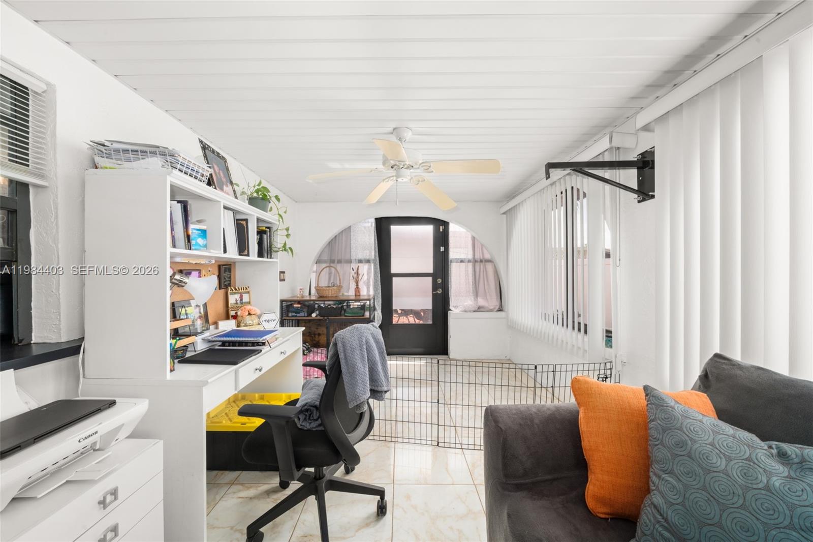 4201 Westminster Road Sebring, FL 33875 - Photo 9 of 43 a living room with furniture a fireplace and a flat screen tv