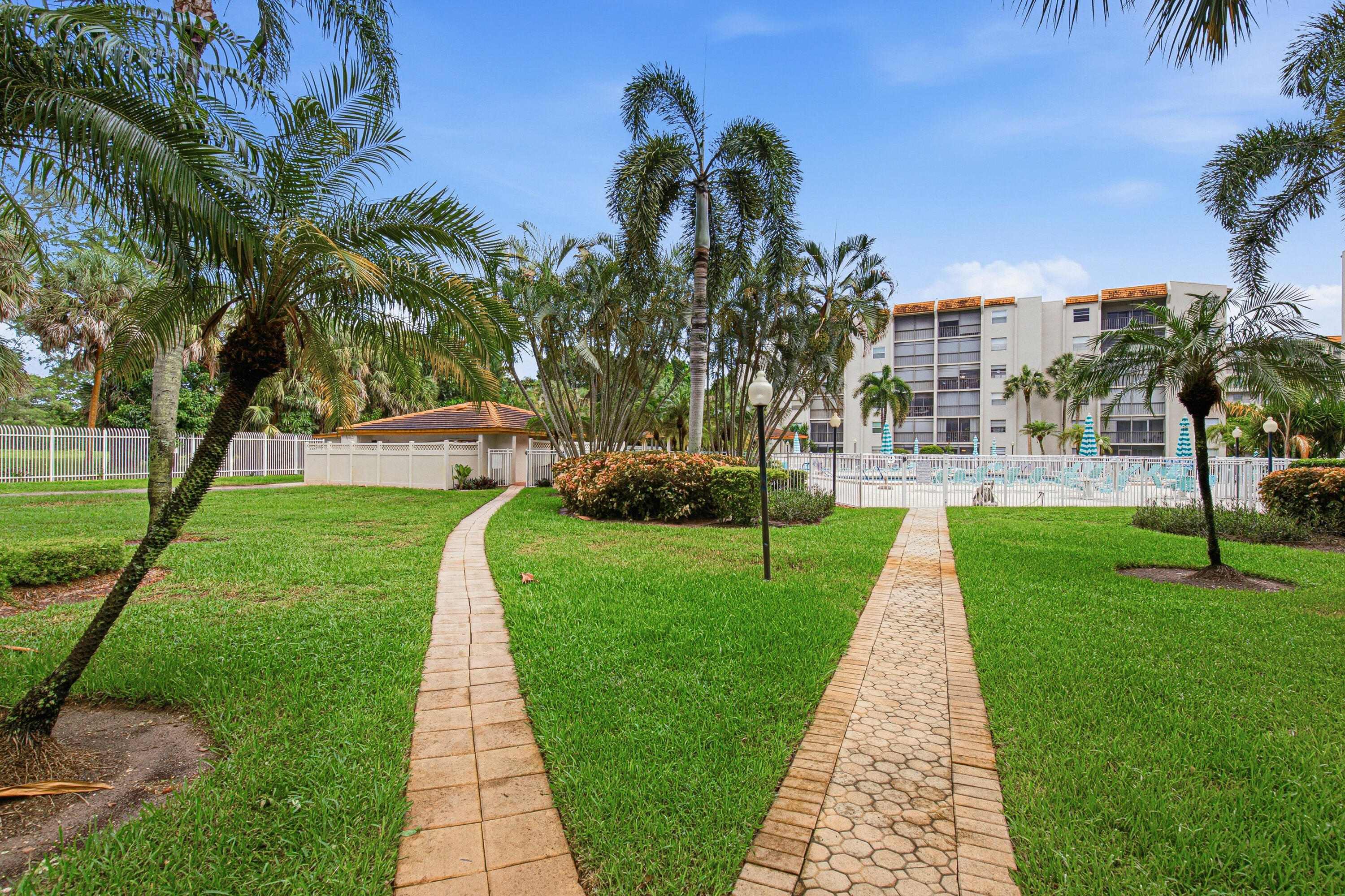 3940 Inverrary Boulevard, Unit 603A Lauderhill, FL 33319 - Photo 29 of 39 Amenities - Pool - Entrance