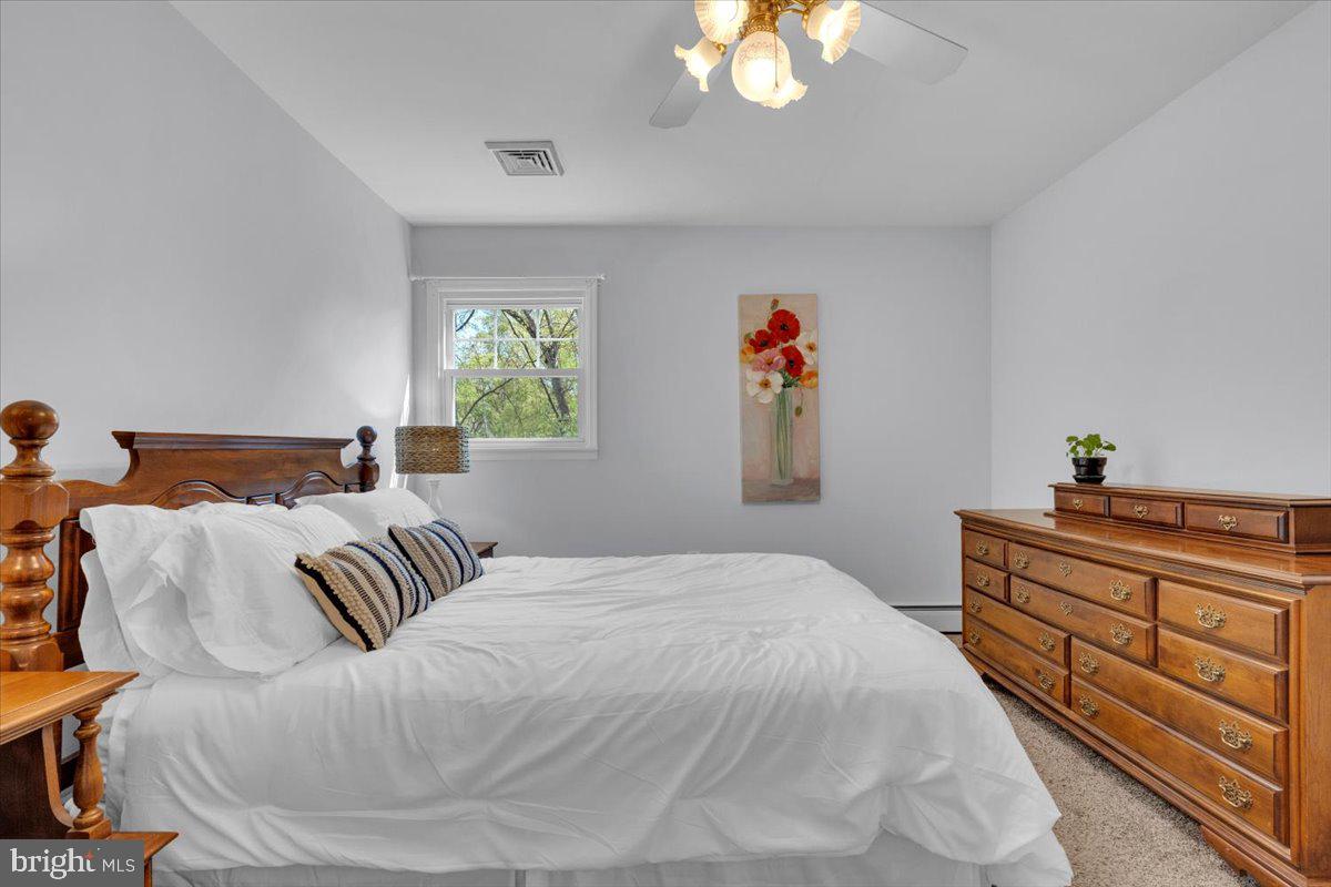 1424 Oakwood Road Coatesville, PA 19320 - Photo 11 of 41 Inviting, airy primary bedroom