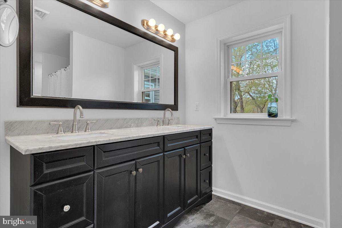 1424 Oakwood Road Coatesville, PA 19320 - Photo 15 of 41 Primary ensuite with double sinks