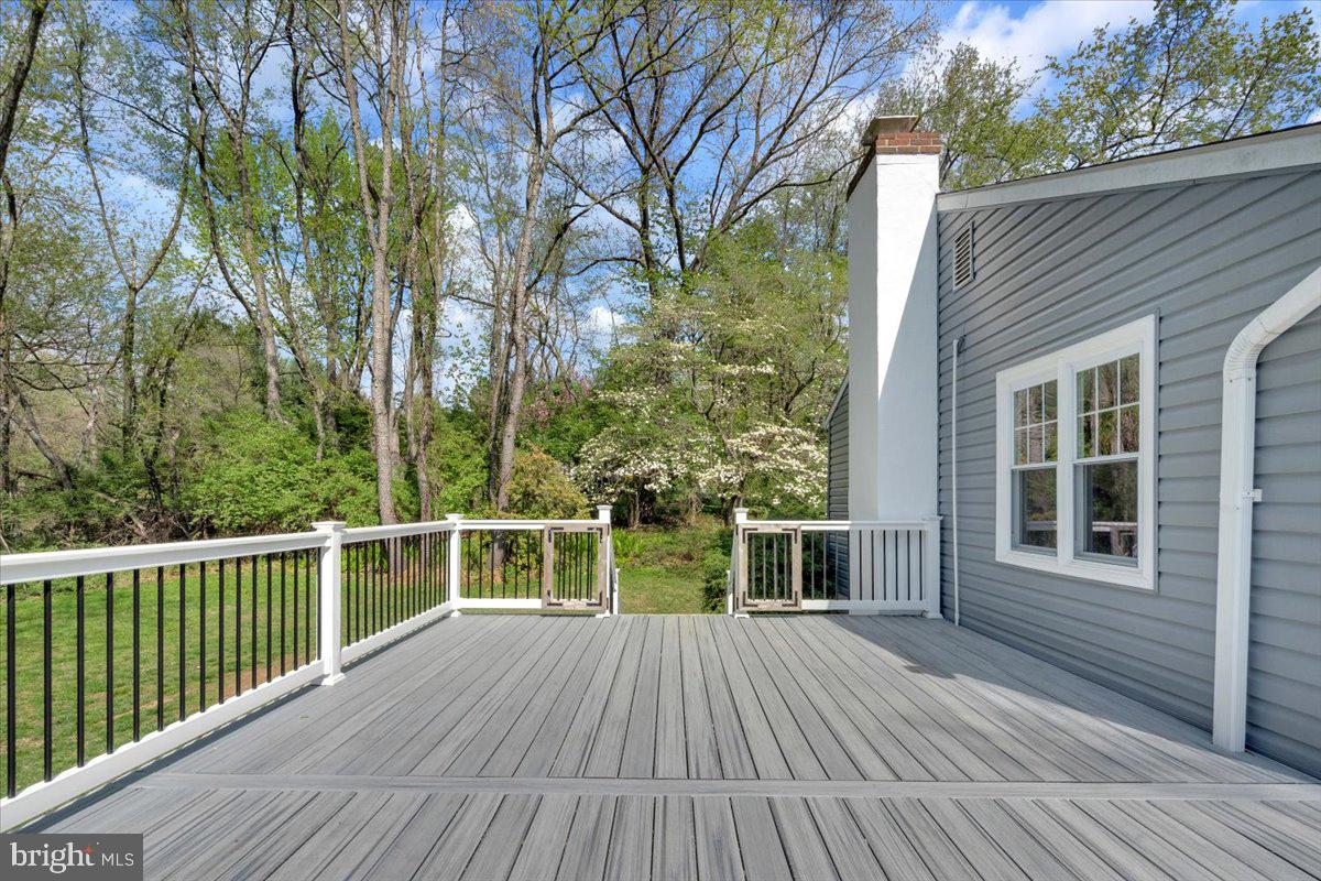 1424 Oakwood Road Coatesville, PA 19320 - Photo 31 of 41 Trex deck with sweeping wooded views