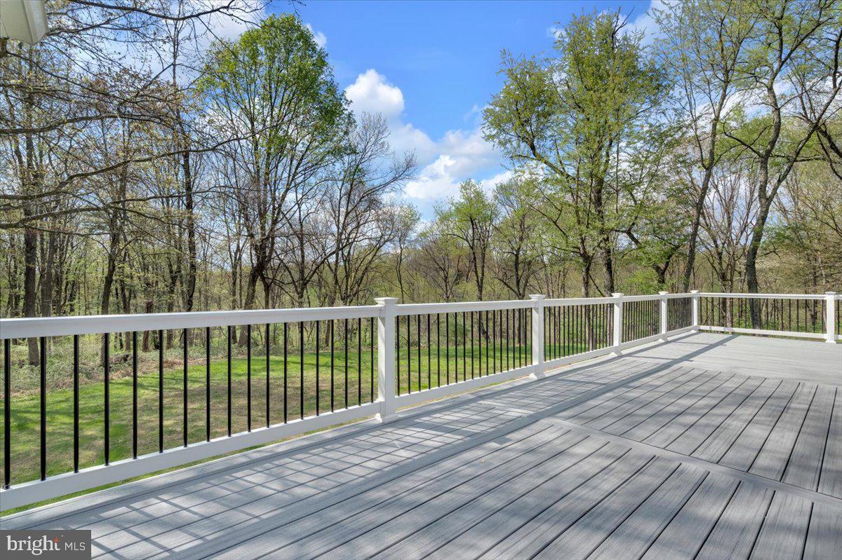 1424 Oakwood Road Coatesville, PA 19320 - Photo 33 of 41 Oversized Trex deck w/wooded view