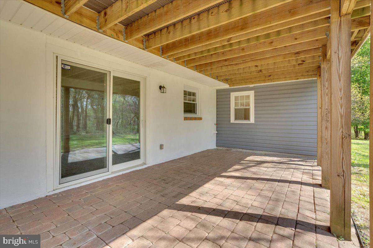 1424 Oakwood Road Coatesville, PA 19320 - Photo 40 of 41 Lower level ample paver patio