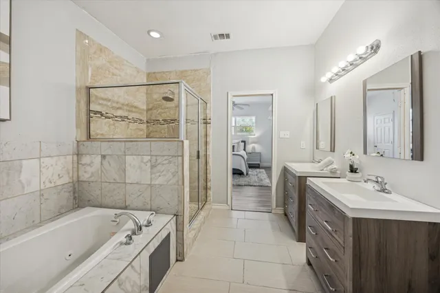 a bedroom with bed and window