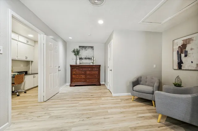a kitchen with stainless steel appliances granite countertop a stove a sink and a cabinets