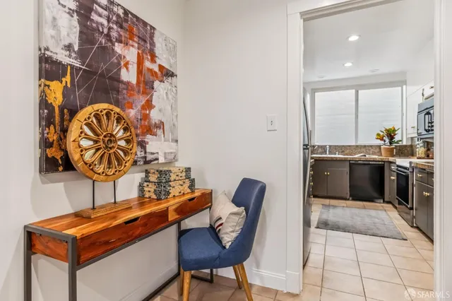 a kitchen with a sink cabinets and window