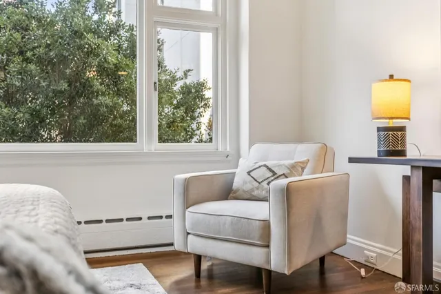 a living room with furniture and a window