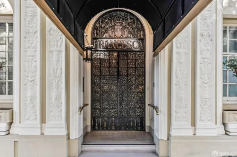 a view of entryway with a front door