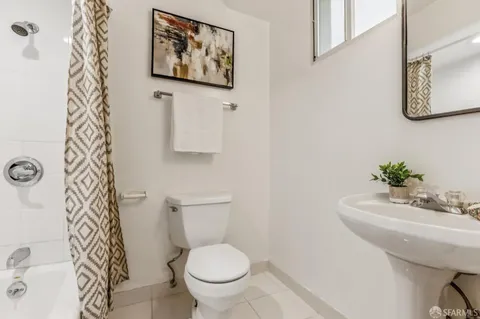 a bathroom with a toilet and sink