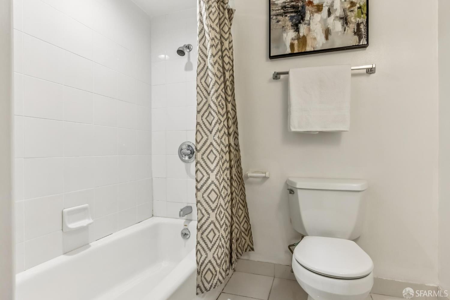 850 Powell Street, Unit 202 San Francisco, CA 94108 - Photo 45 of 51 a white toilet sitting next to a bath tub