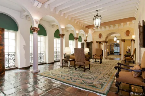 a view of a living room and bathroom