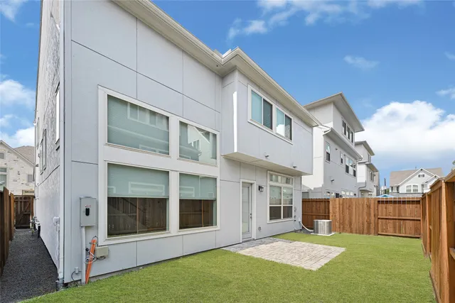 a view of a door and wooden floor