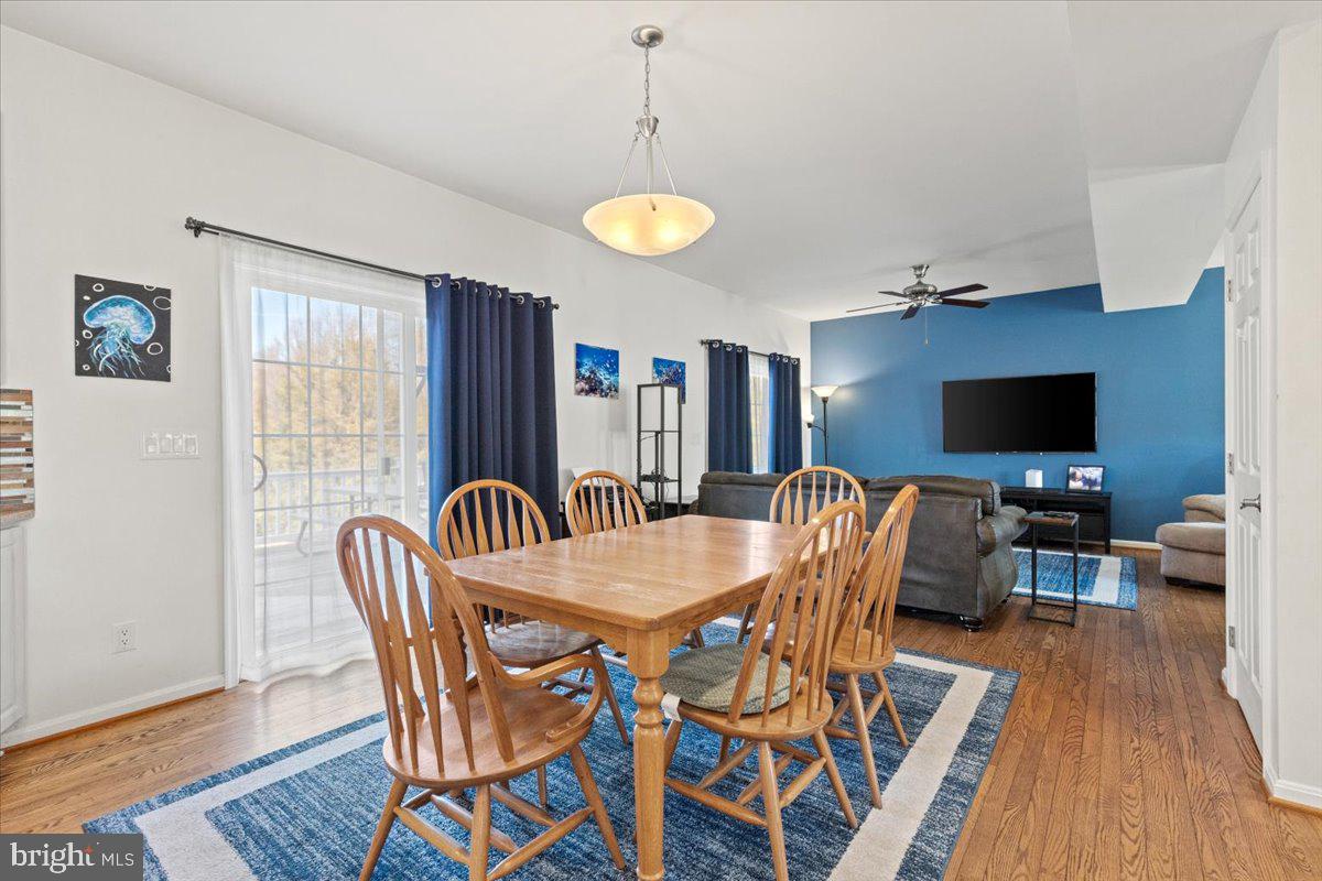 9448 Old Solomons Island Road Owings, MD 20736 - Photo 20 of 49 Breakfast area with sliders to deck