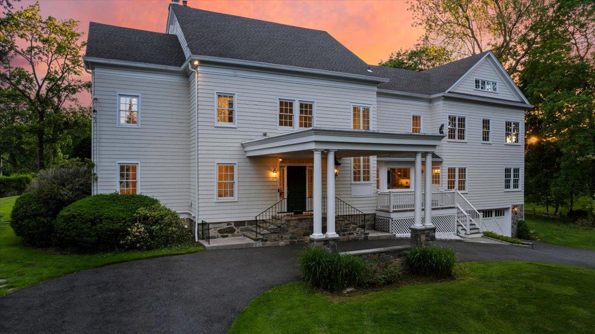 723 Boston Post Road Rye, NY 10580 - Photo 1 of 1 a front view of a house with a yard and porch