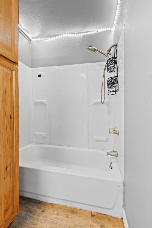 1910 Stringtown Road Shepherd, TX 77371 - Photo 11 of 24 a bathroom with a bathtub and a shower