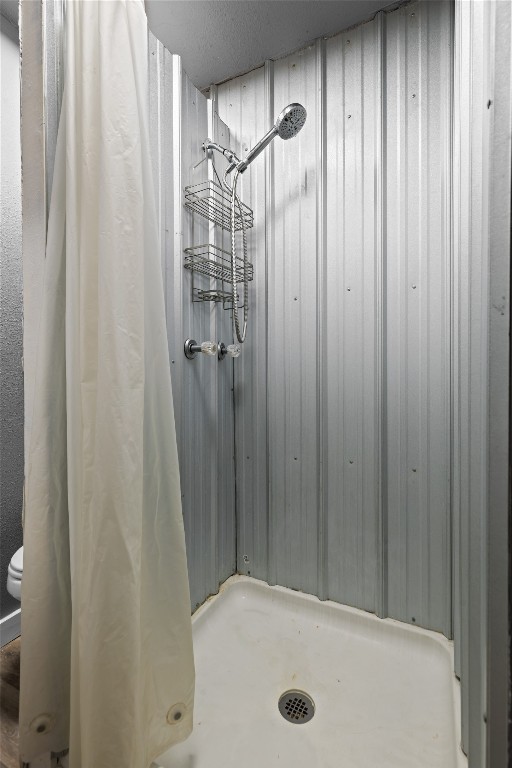 1910 Stringtown Road Shepherd, TX 77371 - Photo 15 of 24 a bathroom with a tub and shower