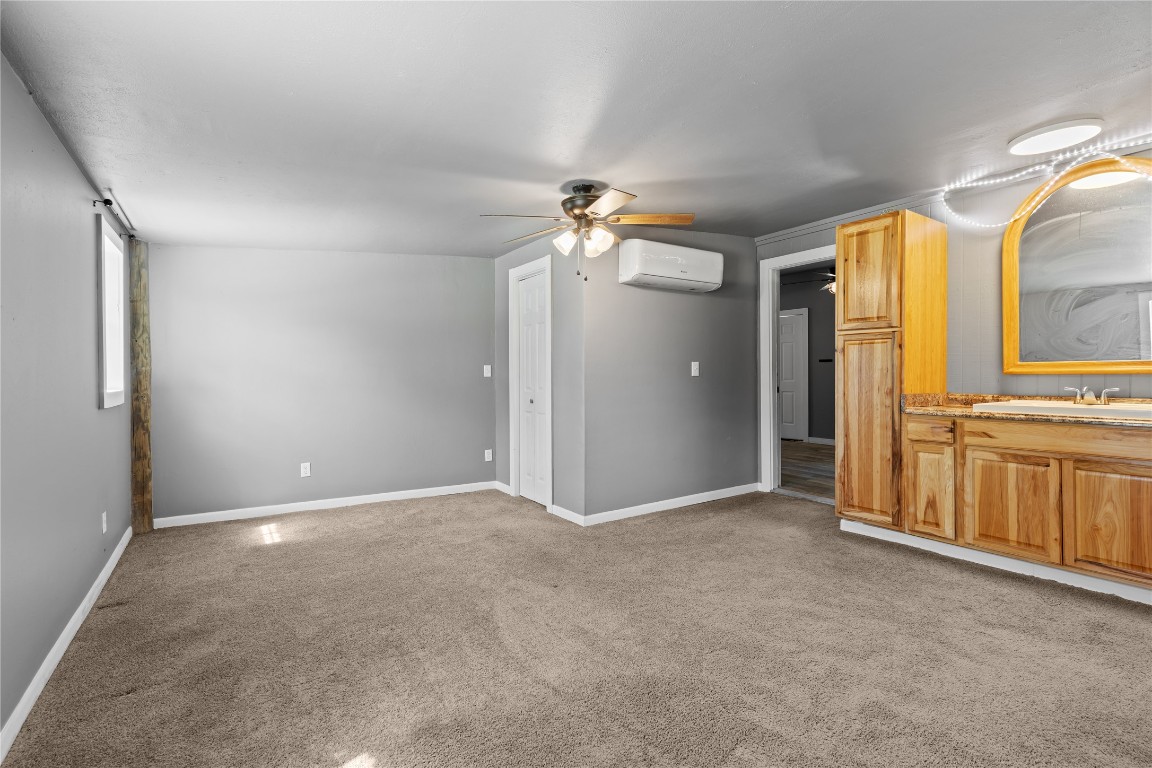 1910 Stringtown Road Shepherd, TX 77371 - Photo 9 of 24 wooden floor in an empty room