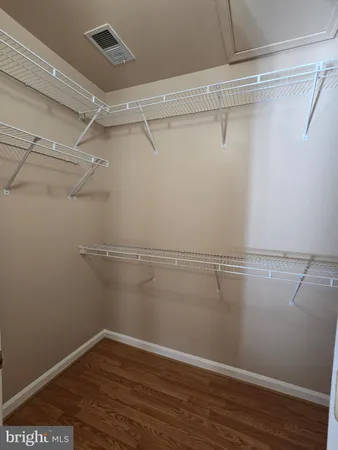 a view of a room with racks on the wall