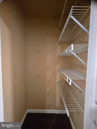 a view of a room with racks on the wall