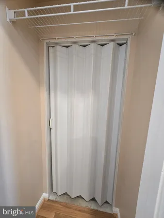 a view of swimming pool with sitting area