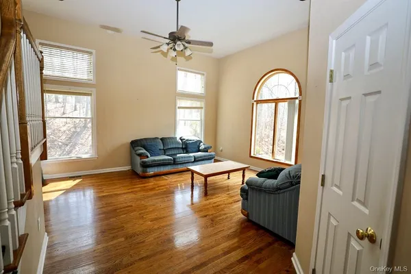 a living room with furniture and a window