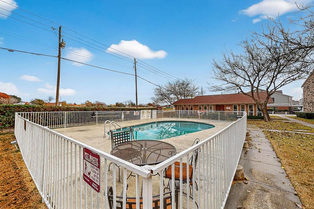 2200 East Trinity Mills Road, Unit 616 Carrollton, TX 75006 - Photo 25 of 25 a view of a balcony with wooden floor