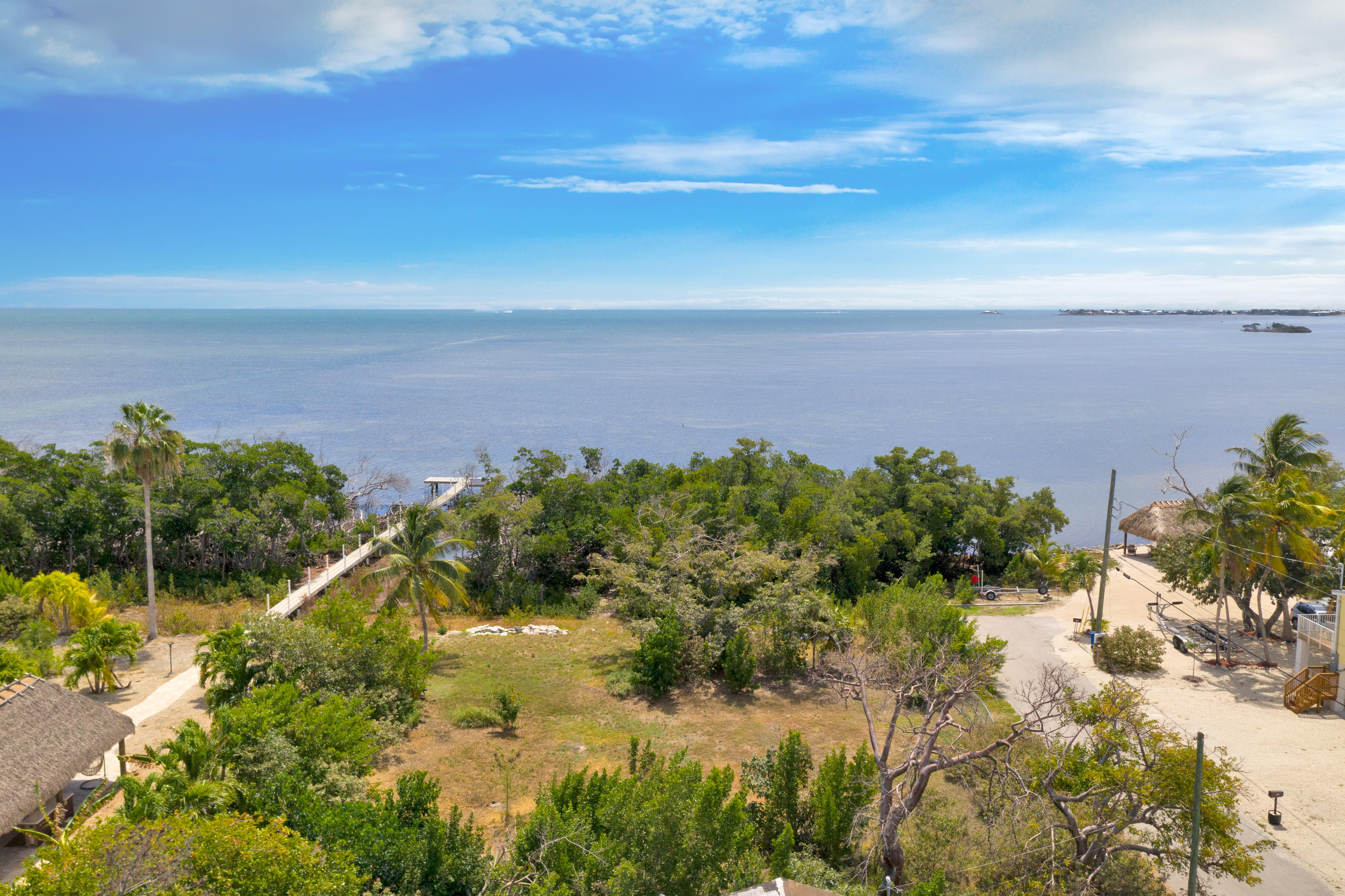 68th Street Marathon, FL 33050 - Photo 2 of 16 a view of a garden with a building in back