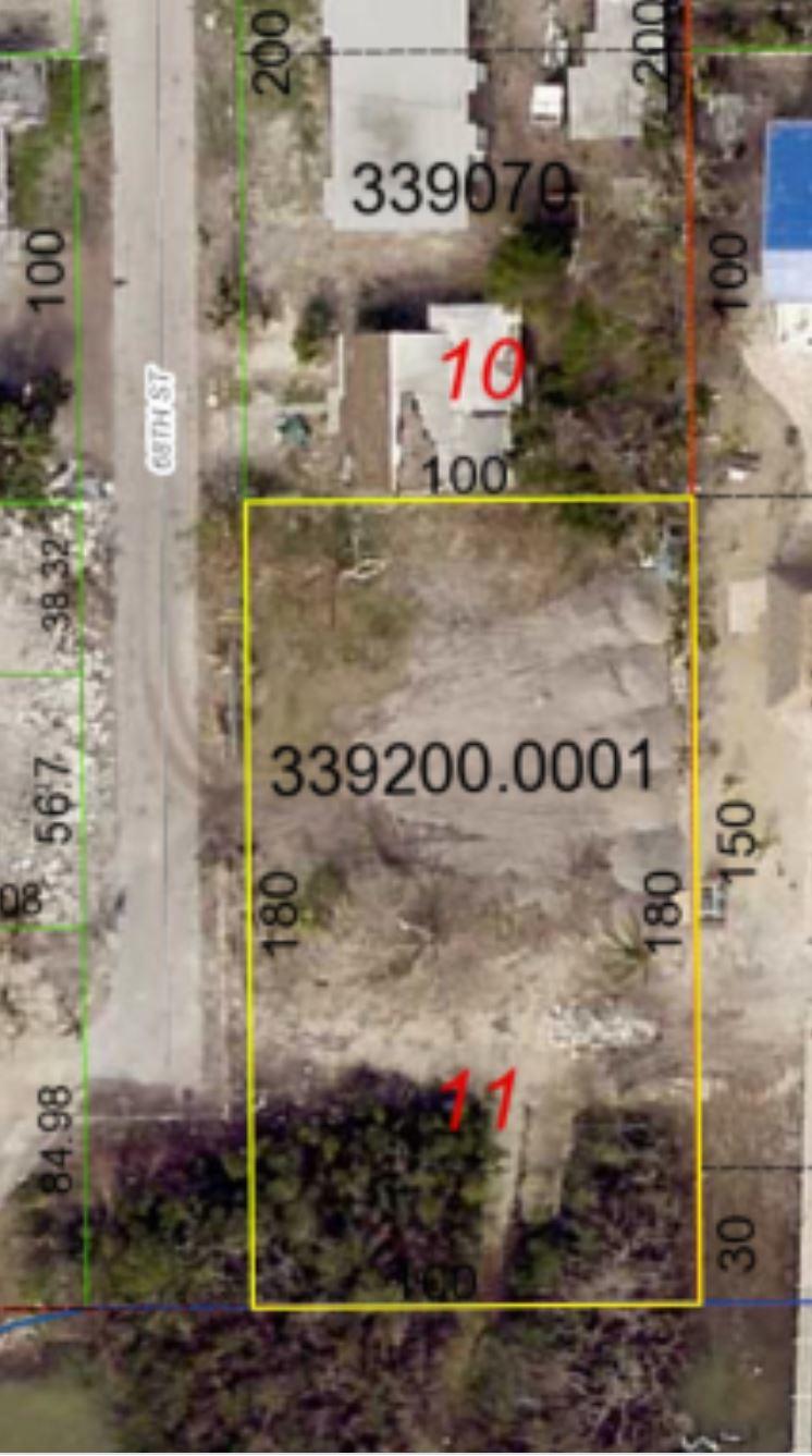 68th Street Marathon, FL 33050 - Photo 16 of 16 a street sign on a brick wall