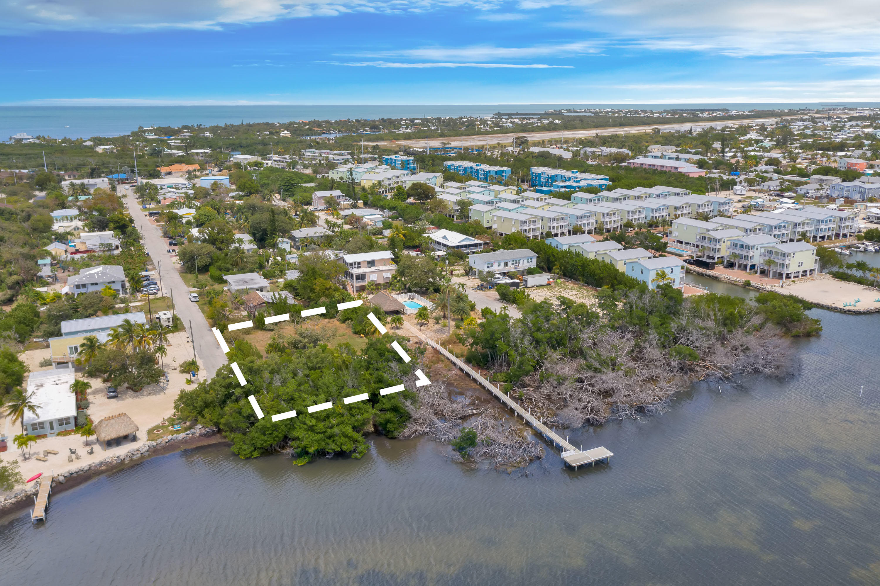 68th Street Marathon, FL 33050 - Photo 5 of 16 an aerial view of residential houses with outdoor space