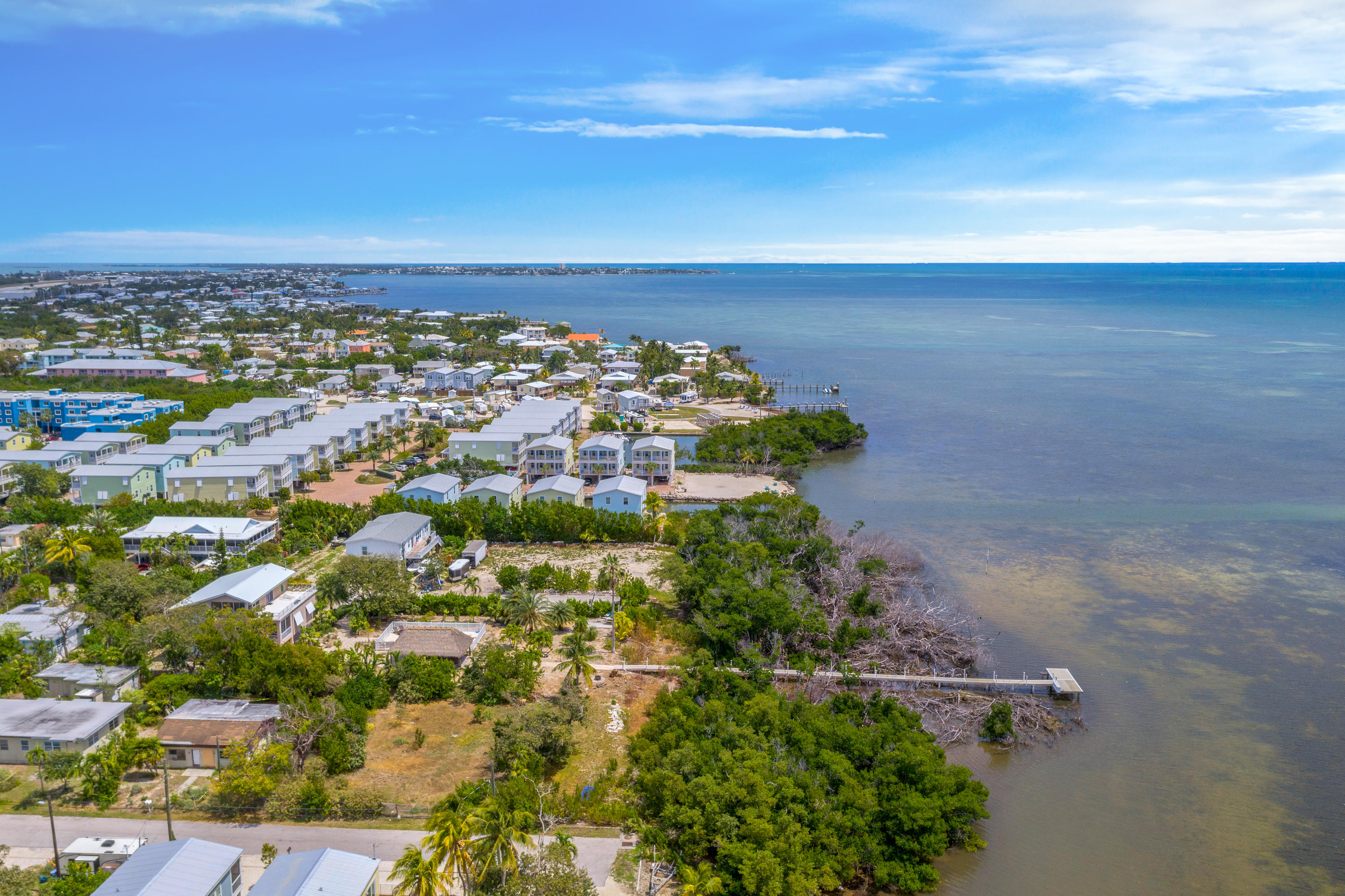 68th Street Marathon, FL 33050 - Photo 8 of 16 an aerial view of a city with lots of residential buildings