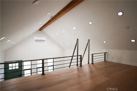 a view of a hall with stairs