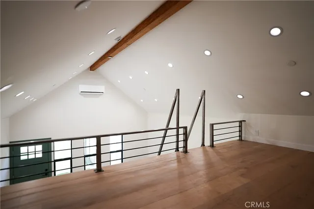 a view of a hall with stairs