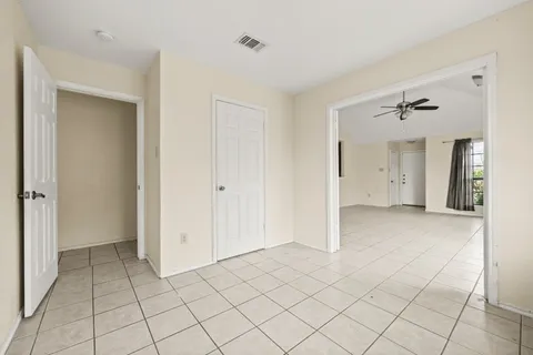 a view of an empty room and window