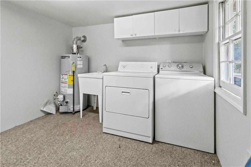 2314 Wayside Drive Brookhaven, GA 30319 - Photo 16 of 17 a utility room with dryer and washer