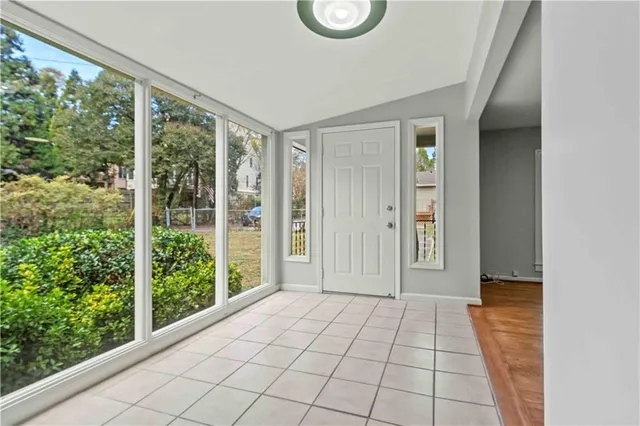 an empty room with wooden floor