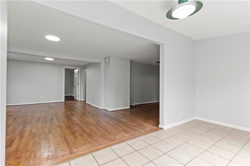 2314 Wayside Drive Brookhaven, GA 30319 - Photo 3 of 17 an empty room with wooden floor