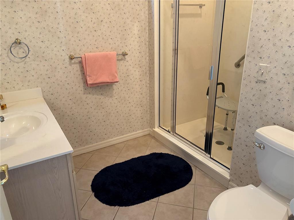 9288 Southwest 93rd Circle Ocala, FL 34481 - Photo 16 of 24 a bathroom with a toilet and a sink