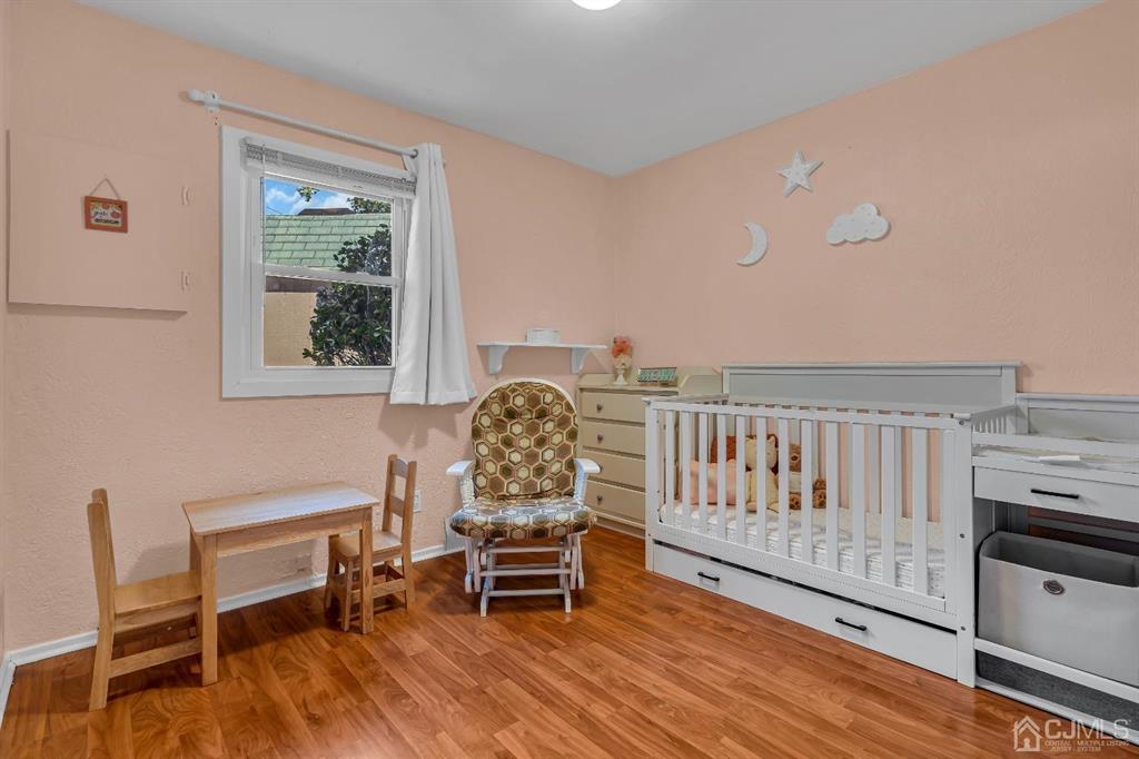 462 Old Post Road Edison, NJ 08817 - Photo 13 of 19 a living room with furniture and a wooden floor