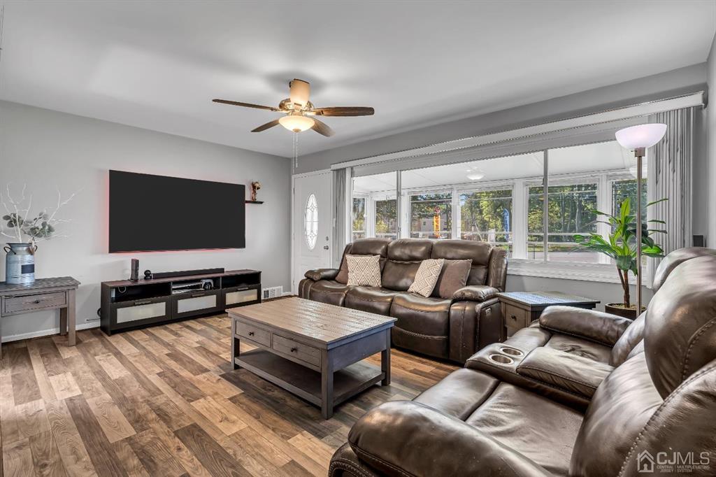 462 Old Post Road Edison, NJ 08817 - Photo 6 of 19 a living room with furniture and a flat screen tv