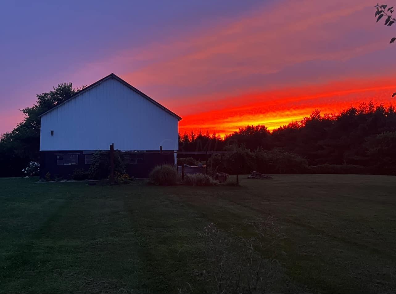 1540 Buttermilk Hill Road Delaware, OH 43015 - Photo 64 of 68 Sunset over barn