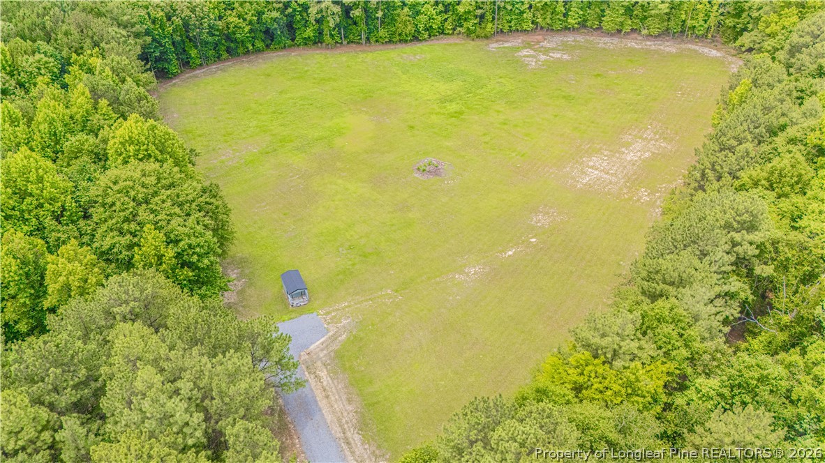 140 Hardy Road Carthage, NC 28327 - Photo 2 of 6 a view of a swimming pool and an outdoor space