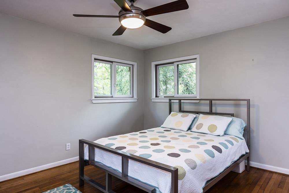 3604 Laurel Circle Raleigh, NC 27612 - Photo 16 of 59 a bedroom with a bed and a window