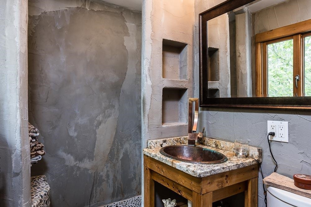 3604 Laurel Circle Raleigh, NC 27612 - Photo 20 of 59 a bathroom with a sink and a mirror