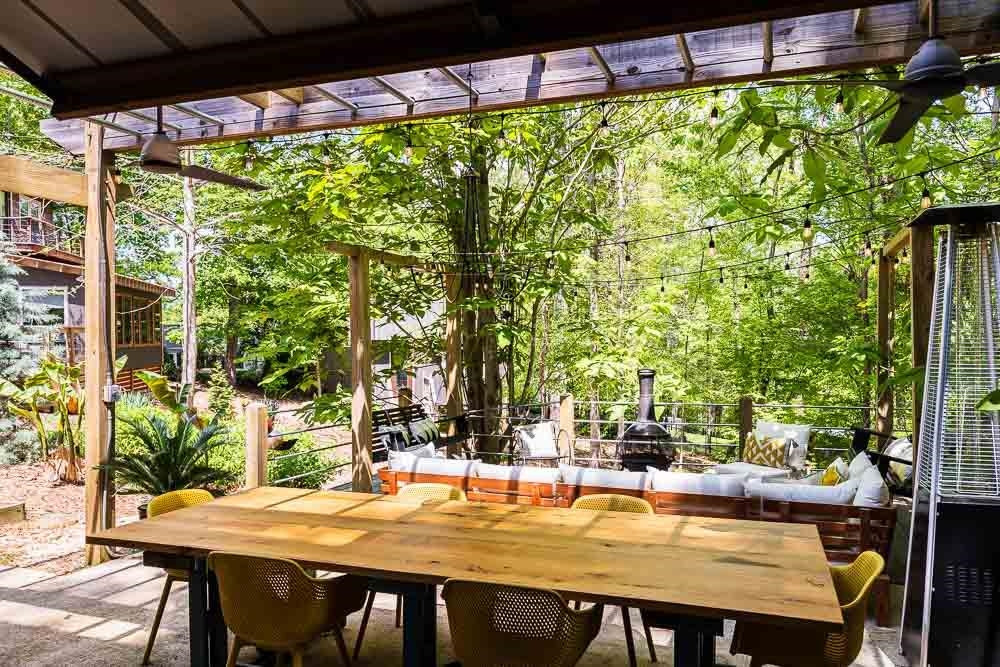 3604 Laurel Circle Raleigh, NC 27612 - Photo 27 of 59 a view of a patio with table and chairs and potted plants