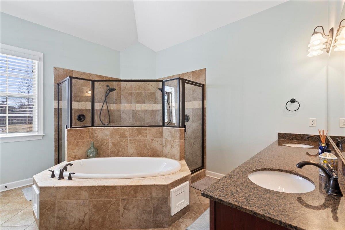 225 Estanaula Road Collierville, TN 38017 - Photo 19 of 38 a bathroom with a granite countertop sink and a mirror