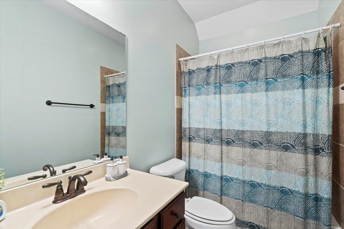 225 Estanaula Road Collierville, TN 38017 - Photo 25 of 38 a bathroom with a sink toilet and shower