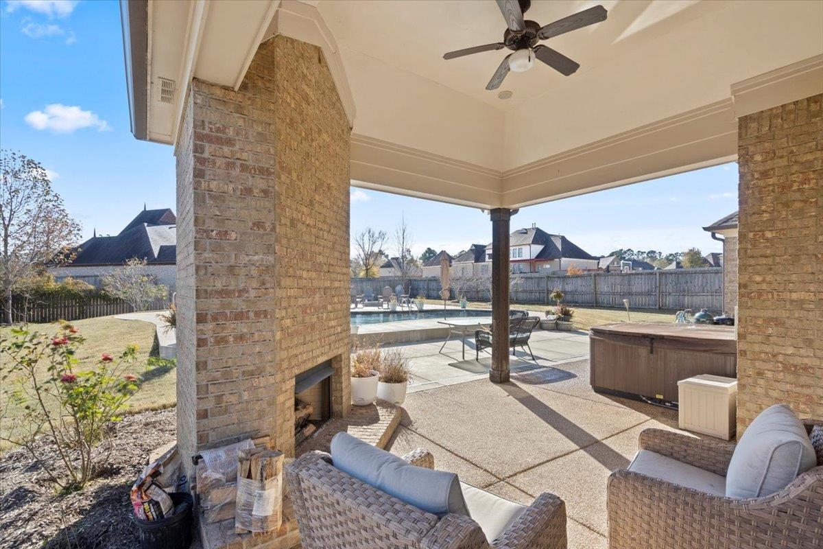225 Estanaula Road Collierville, TN 38017 - Photo 26 of 38 a living room with furniture and a floor to ceiling window