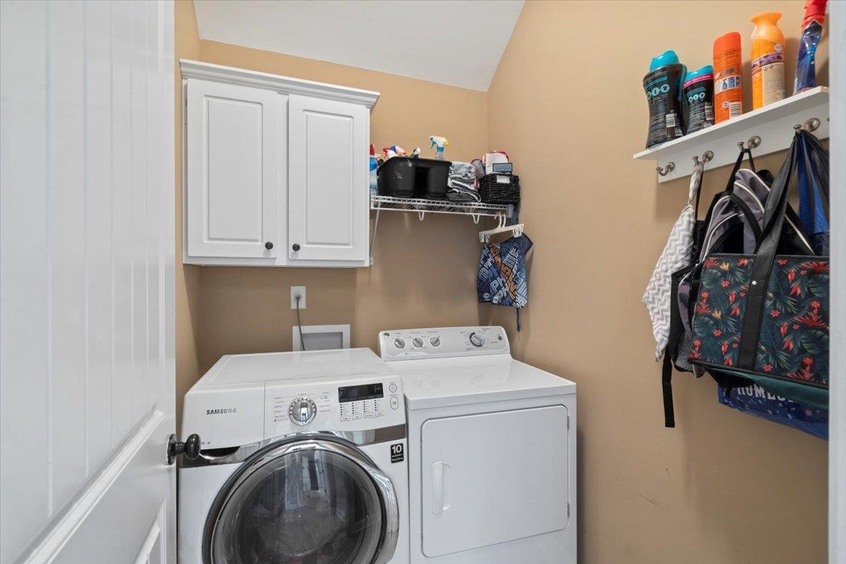225 Estanaula Road Collierville, TN 38017 - Photo 37 of 38 a utility room with dryer and washer