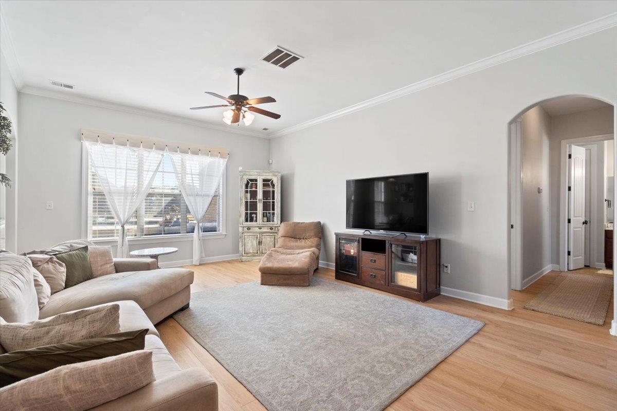 225 Estanaula Road Collierville, TN 38017 - Photo 7 of 38 a living room with furniture and a flat screen tv